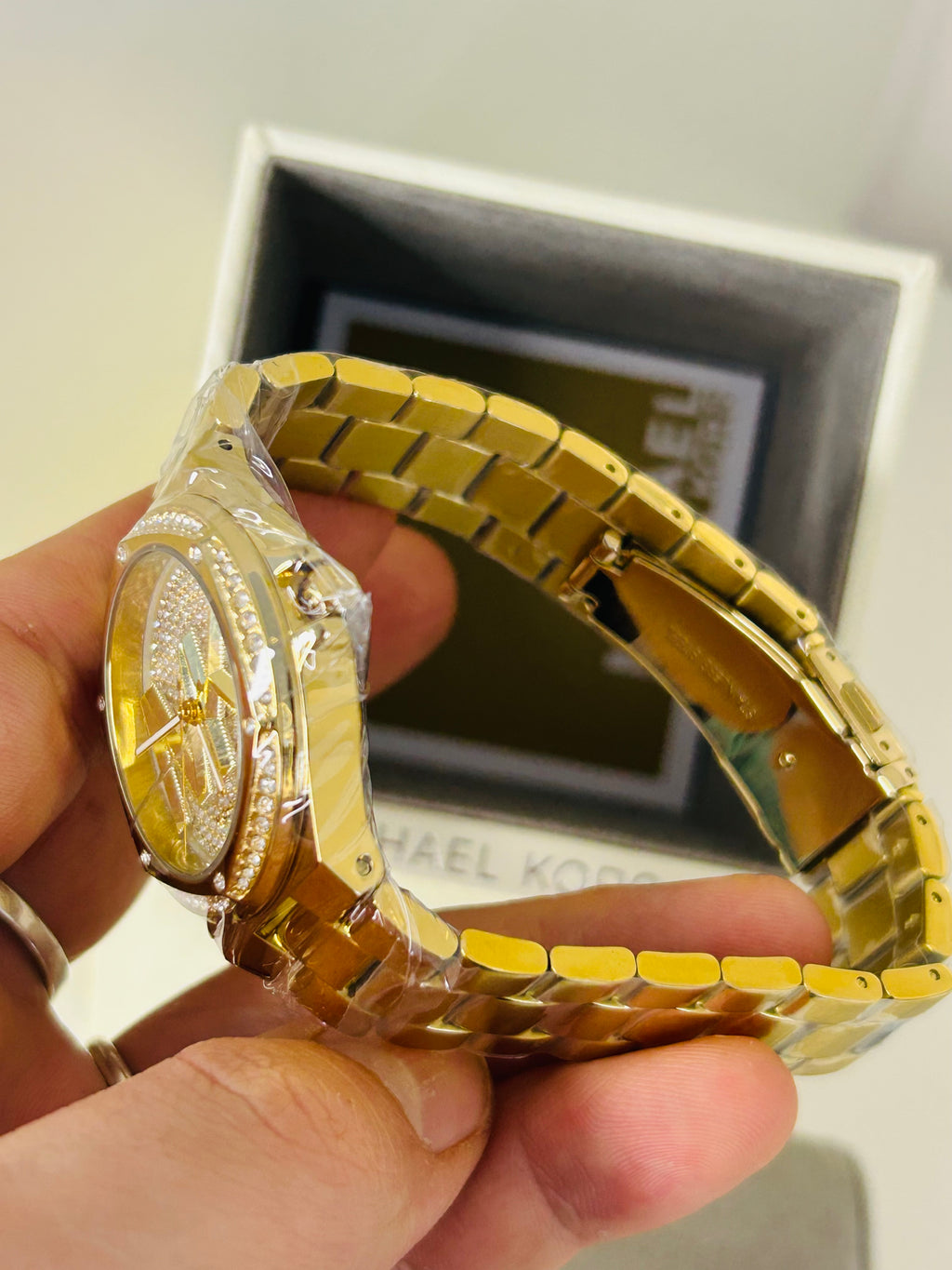 montre michael kors lennox dorée pavée mk