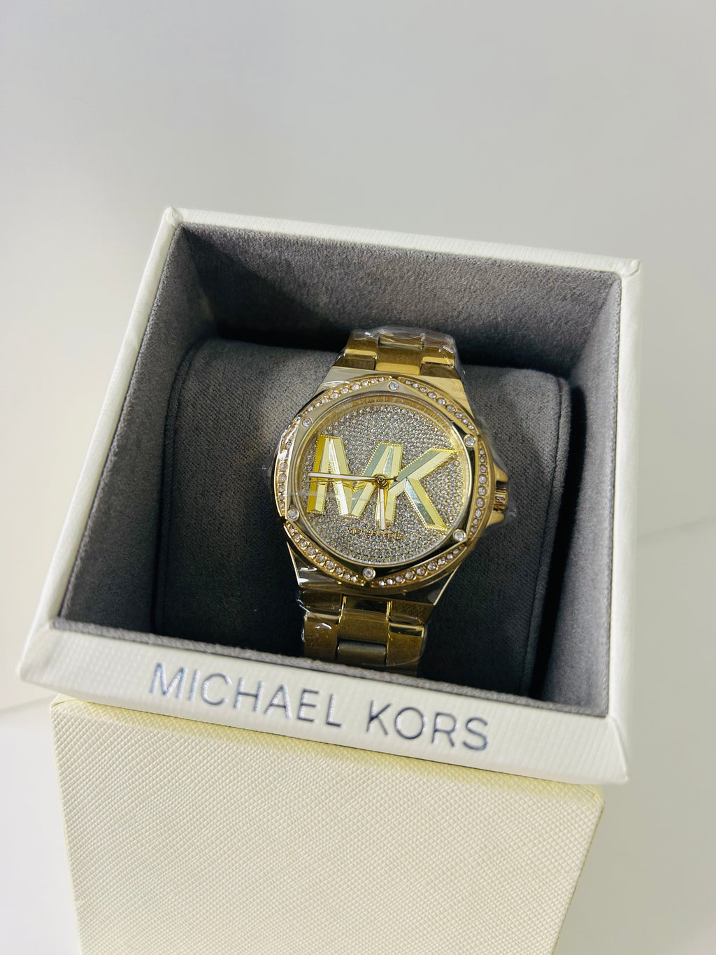 montre michael kors lennox dorée pavée mk
