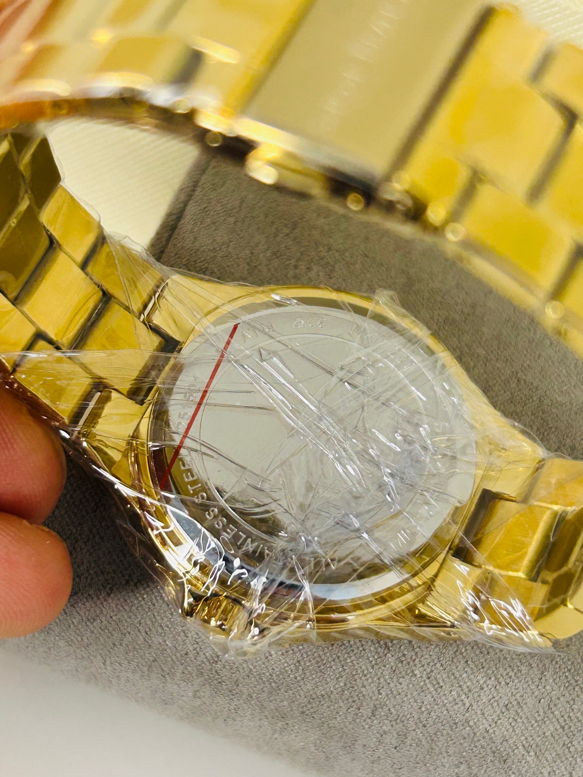 montre michael kors lennox dorée pavée mk