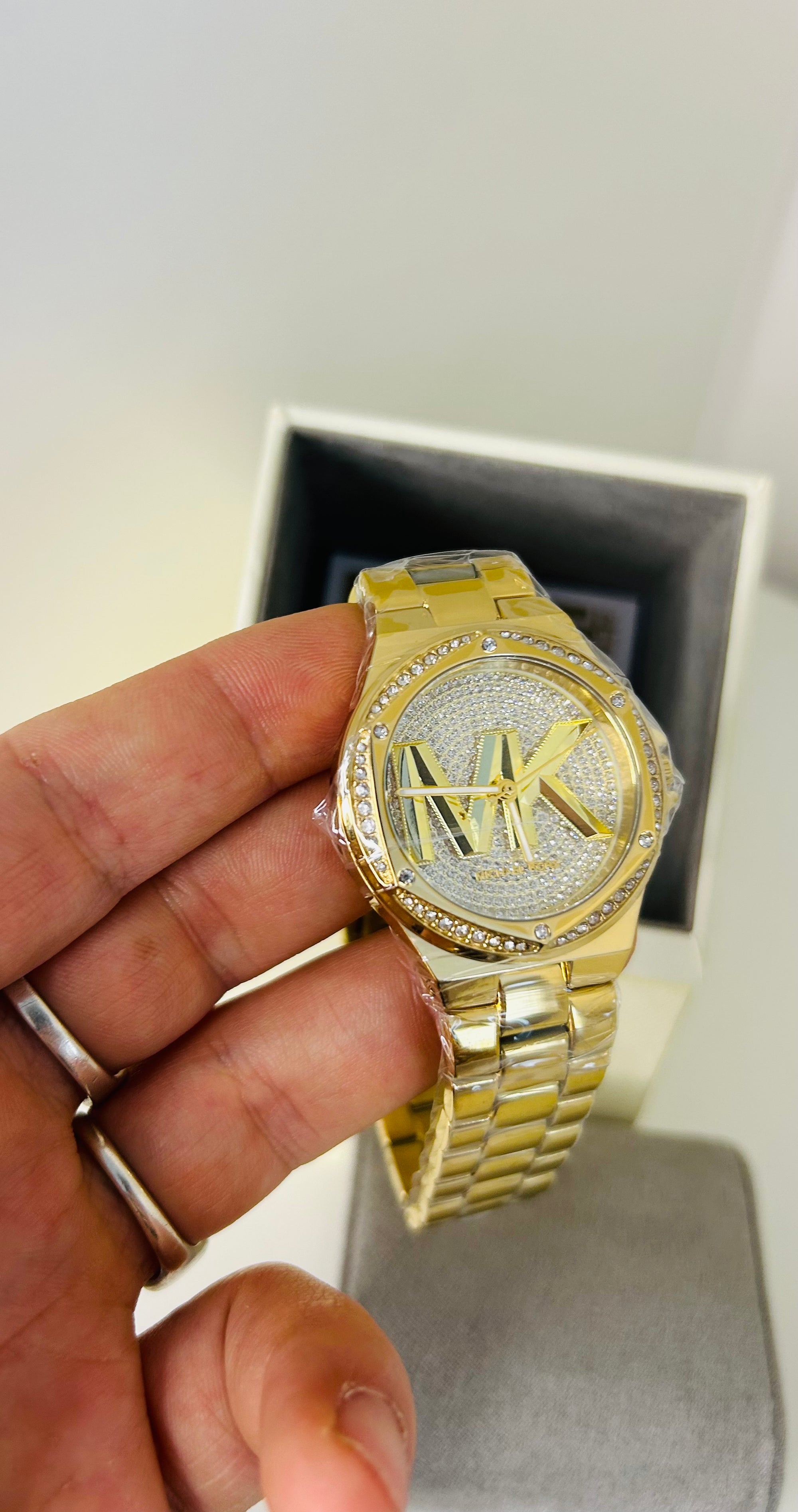 montre michael kors lennox dorée pavée mk