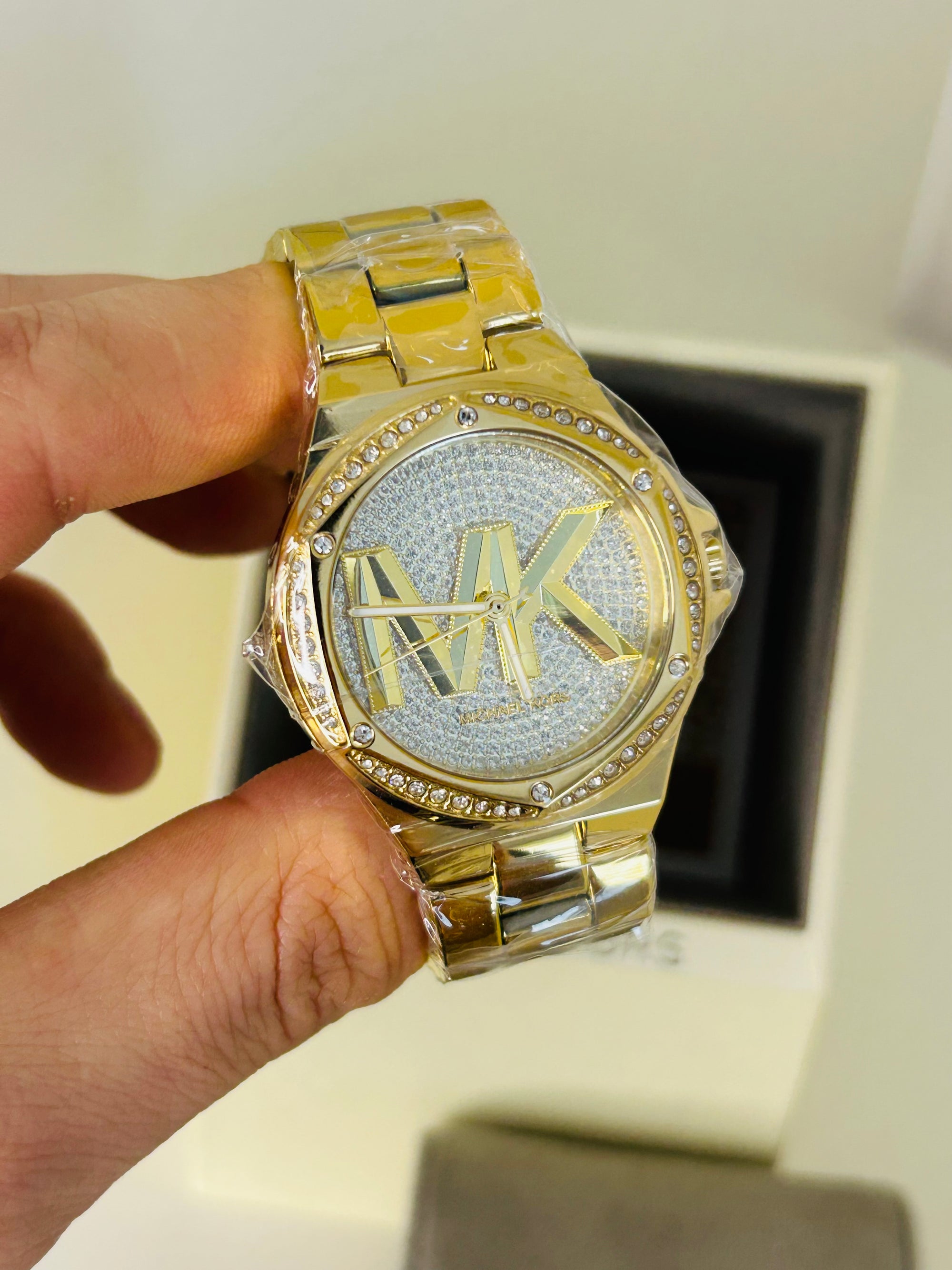 montre michael kors lennox dorée pavée mk